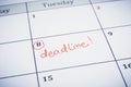 Deadline date writting on timeline planner. Royalty Free Stock Photo